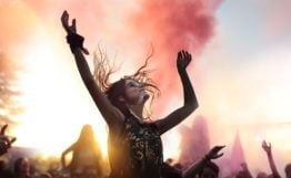Image of a girl dancing in the crowd