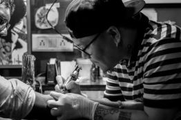 a man getting tatto