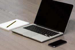 minimalist office with lap top as one of the good design ideas to try in your Upper East Side office