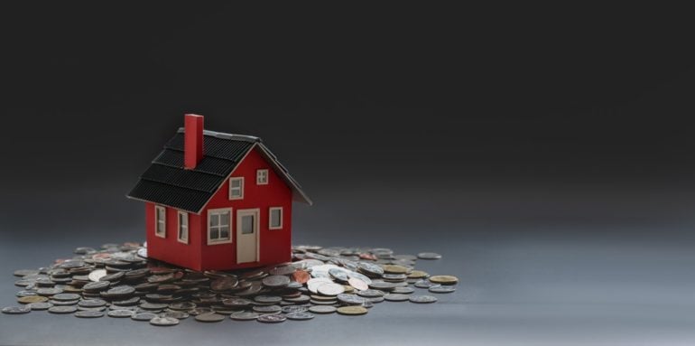 Brooklyn vs Manhattan home prices represented by toy house