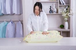 woman using a vacuum bag