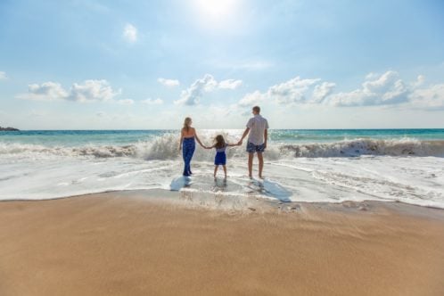 family walk on a Long Island beach