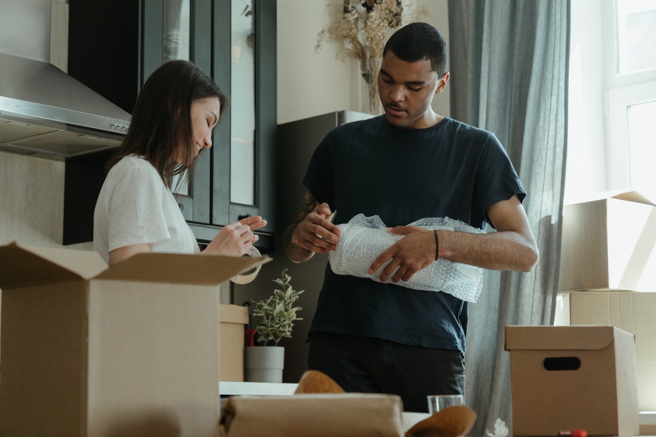 Man and woman packing