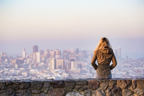 A woman watching Manhattan from a distance