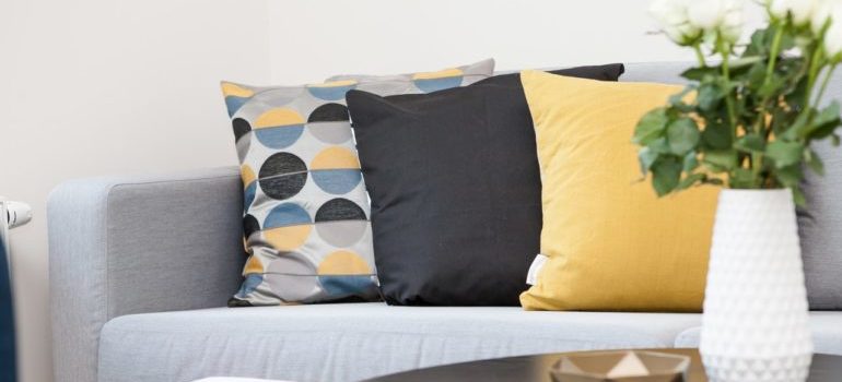 Downsizing in Manhattan means investing in furniture that can hold your belongings