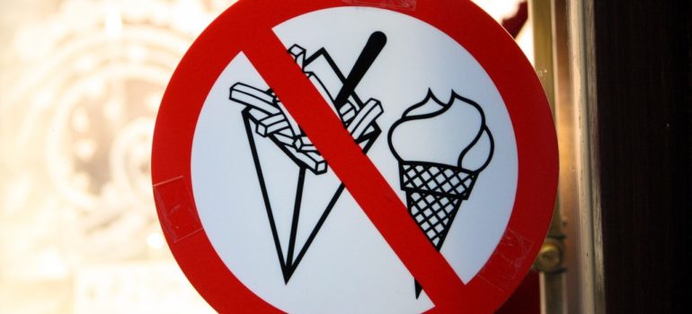 a sign that does not allow food beyong a certain point as some forbidden items to store inside a self-storage unit 