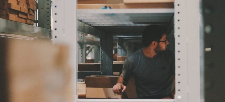 a man looking through one of the safest storage options in Manhattan