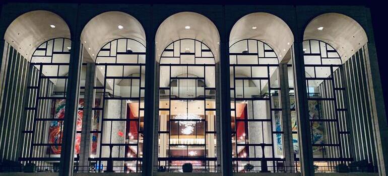 a big theater with glass windows