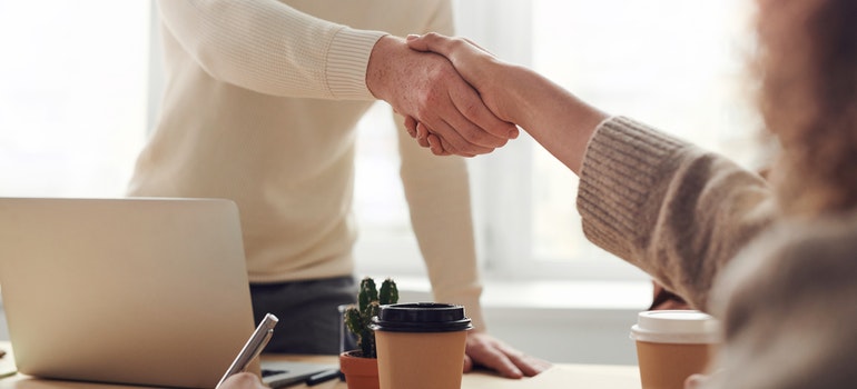 Two people shaking hands