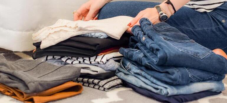 Person folding clothes