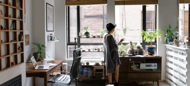 a girl moving to a small apartment in Queens