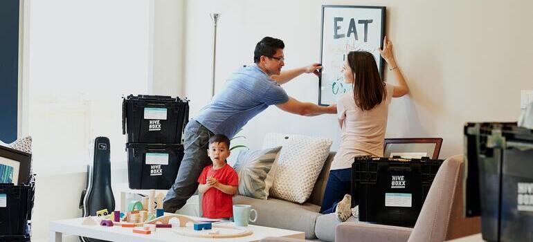 family preparing for relocation and discussing which NYC neighborhoods are best for big families