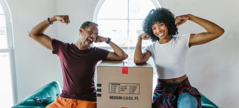 A couple trying to figure out who will help you pack for a relocation 
