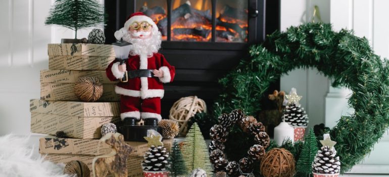 Santa claus near fireplace
