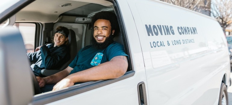 movers in a van preparing to store your artwork when moving from one Manhattan apartment to another