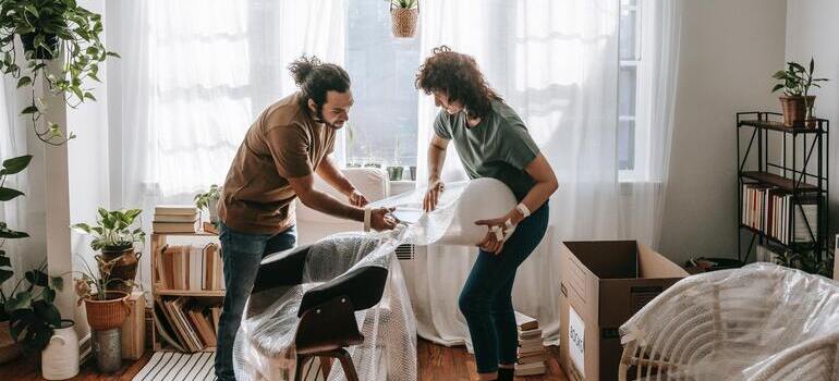 couple is packing your furniture