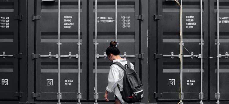 storage lockers woman looking into the advantages of traditional storage spaces