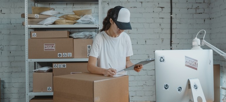 woman working in a storage units office