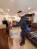 Mover packing boxes for a customer